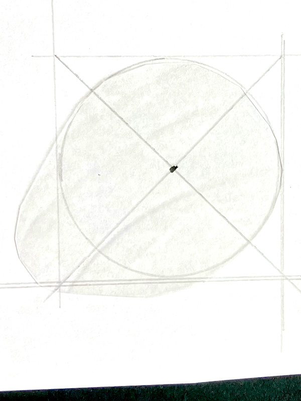 Pencil sketch of circle within square guidelines